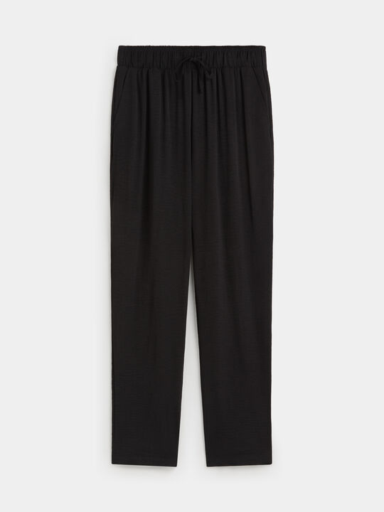 PANTAL&Oacute;N JOGGER FLUIDO Negro image number null