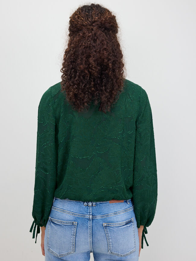 BLUSA ABULLONADA TRANSPARENCIAS Botella
