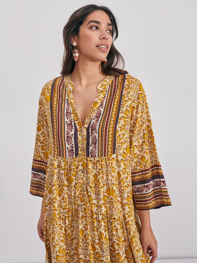 Vestido cenefa vuelo Mostaza