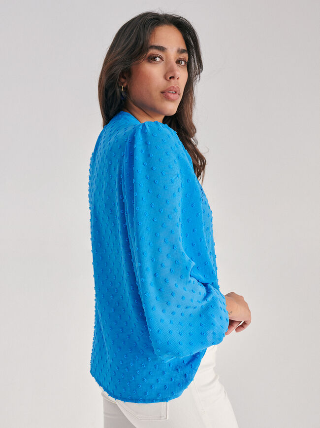 Blusa romántica plumeti raglán Azul Brillante