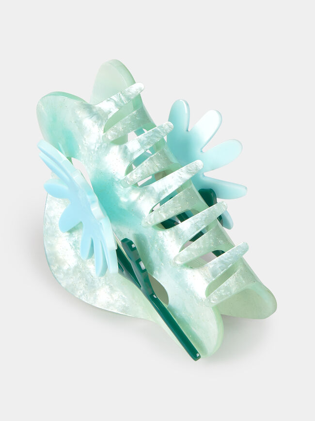 PINZA PLASTICO FLOR Azul Bebe