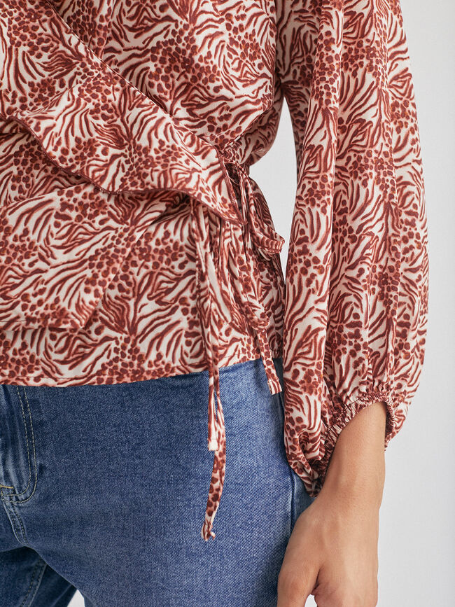 Blusa cruzada volante Crudo