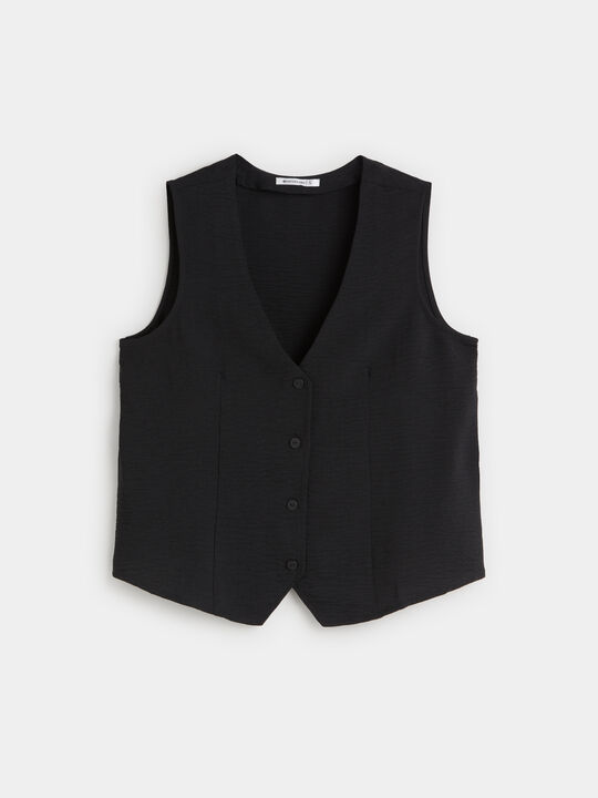 CHALECO BOTONES PEQUE&Ntilde;OS Negro image number null