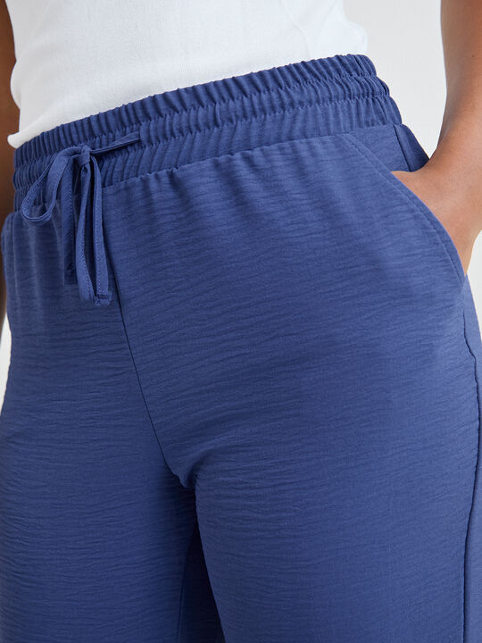 PANTAL&Oacute;N JOGGER AZUL TINTA image number null