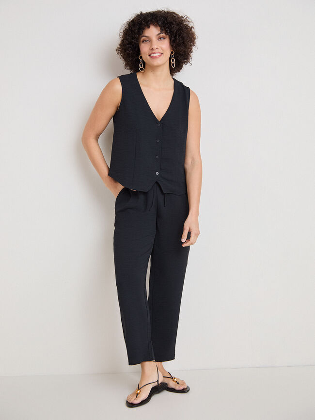 CHALECO BOTONES PEQUE&Ntilde;OS Negro