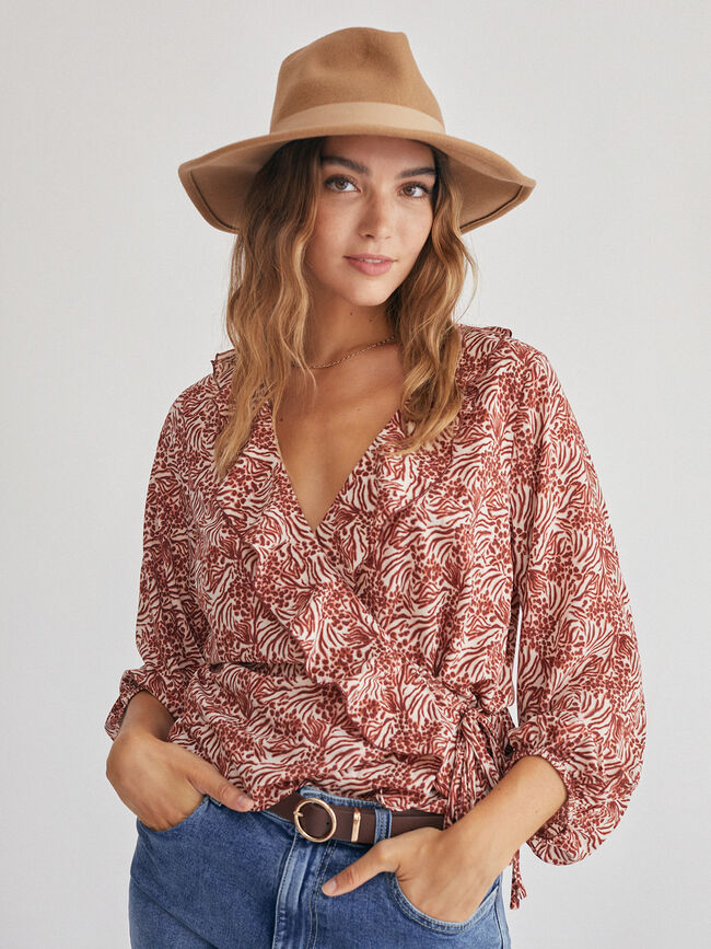 Blusa cruzada volante Crudo