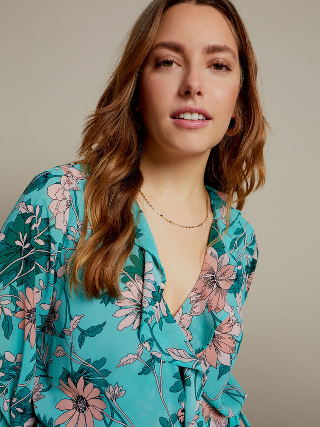 BLUSA CRUZADA ESTAMPADA CON VOLANTES Estampado 1