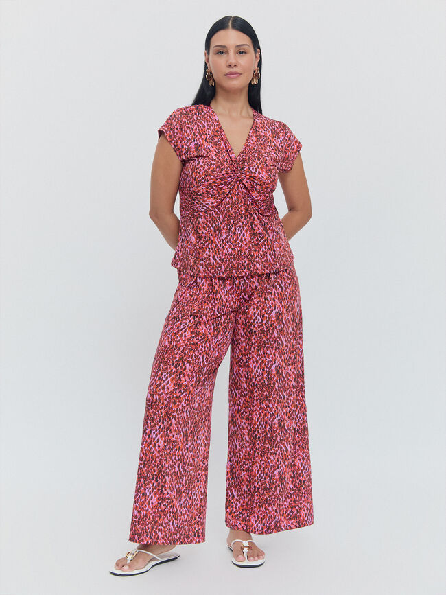 PANTALON ACAMPANADO ESTAMPADO Fucsia