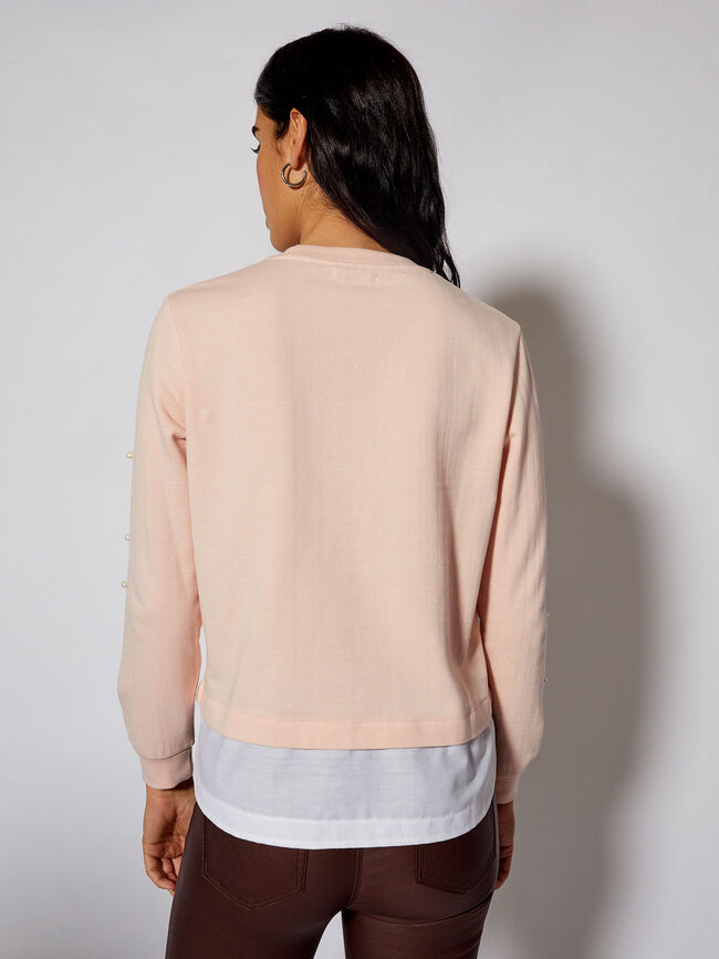 CAMISETA CON PERLAS Y FALDÓN Rosa Claro