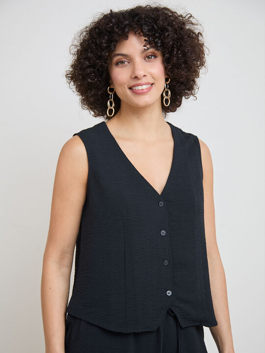 CHALECO BOTONES PEQUE&Ntilde;OS Negro image number null