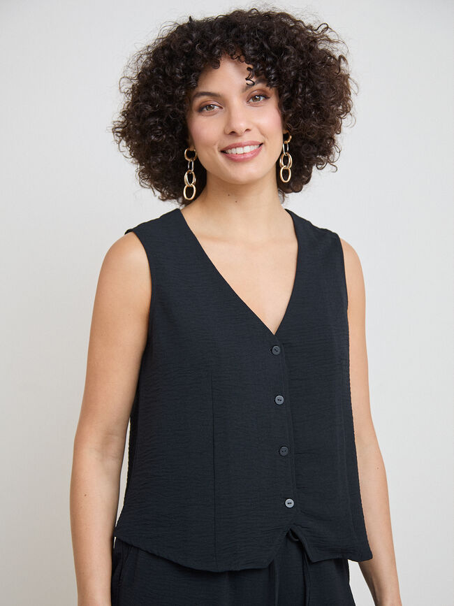 CHALECO BOTONES PEQUE&Ntilde;OS Negro