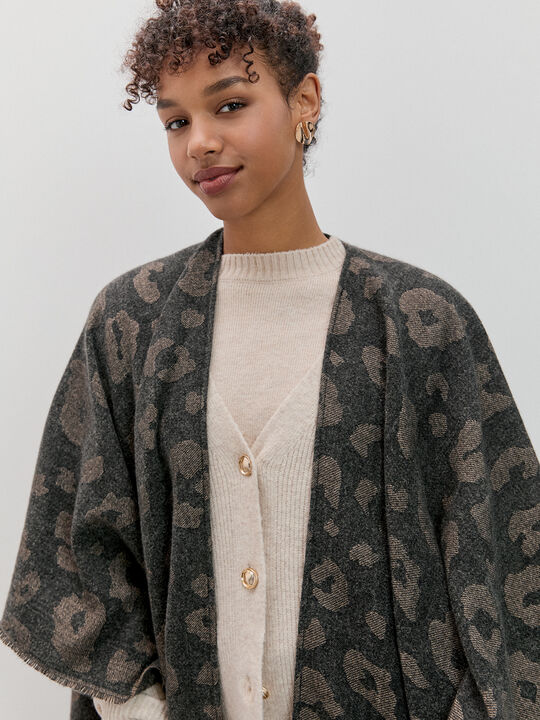 PONCHO ESTAMPADO ANIMAL Negro image number null