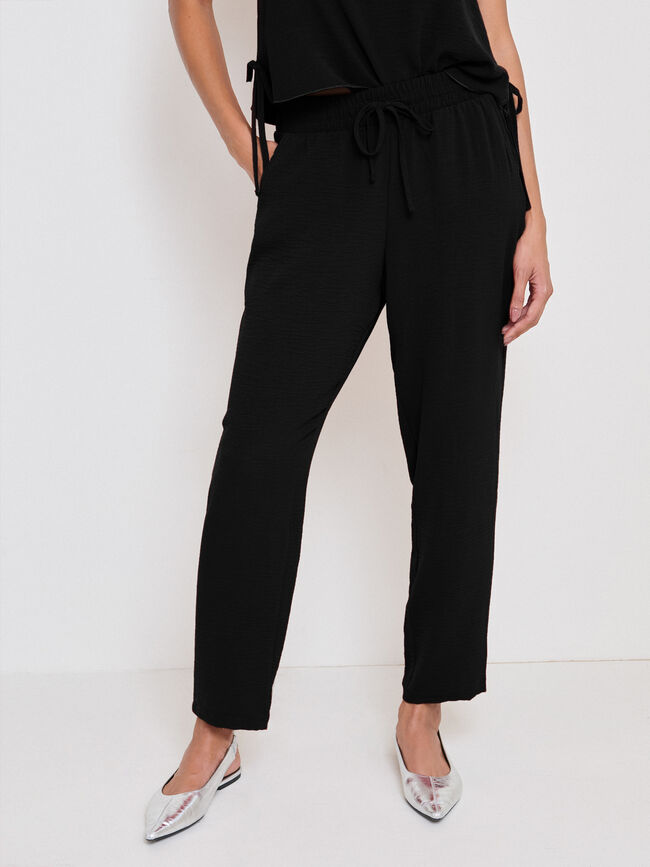 PANTAL&Oacute;N JOGGER FLUIDO Negro