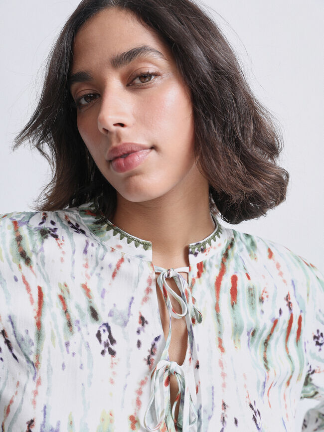 BLUSA CORDONES FLUIDA Crudo