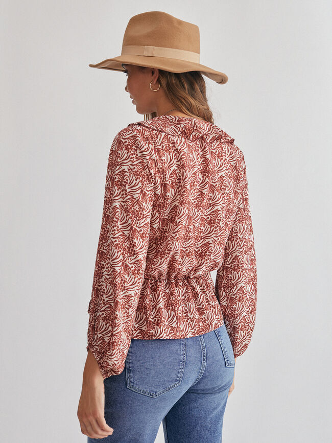 Blusa cruzada volante Crudo