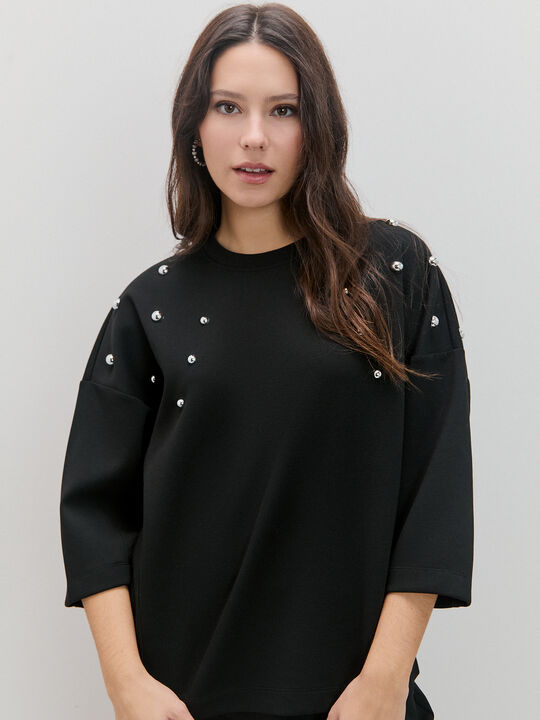 SUDADERA TACHAS Negro image number null