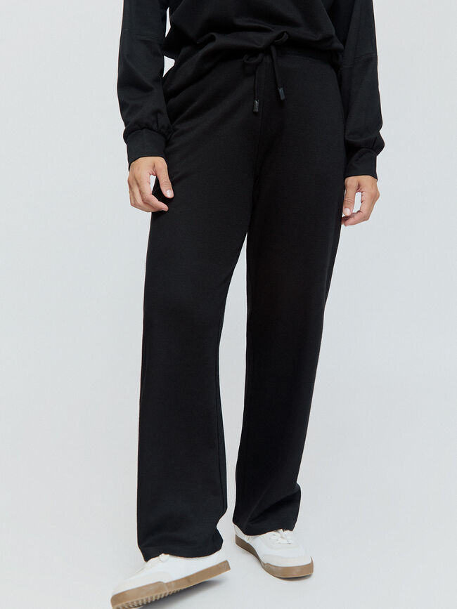 PANTALON BOLSILLOS PARCHE Negro