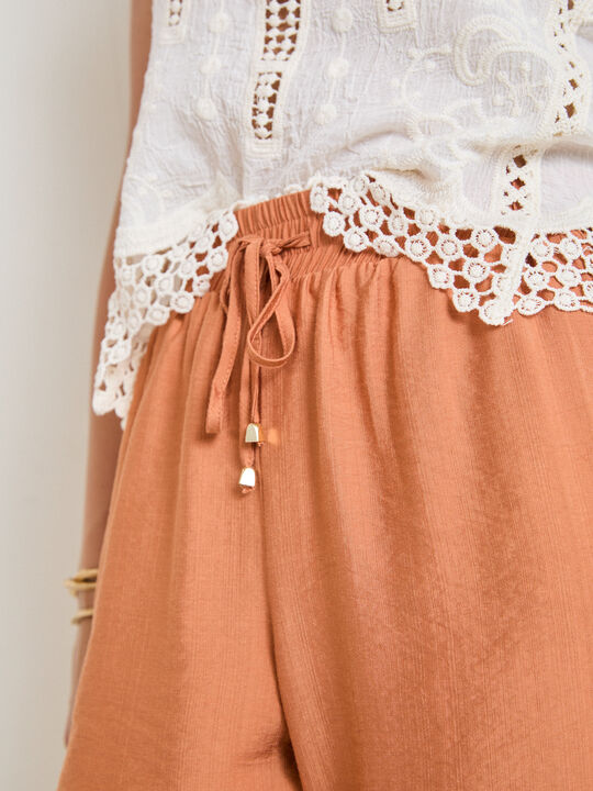 PANTAL&Oacute;N CORTO GOMA Marron Oscuro image number null