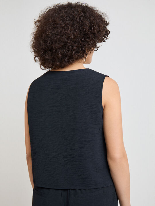 CHALECO BOTONES PEQUE&Ntilde;OS Negro image number null