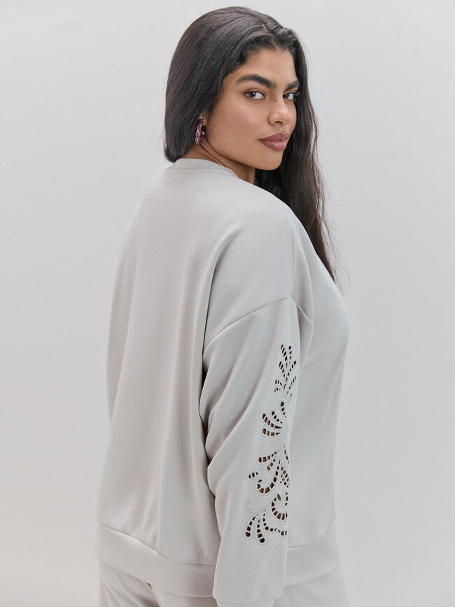 SUDADERA DETALLE TROQUELADO Piedra