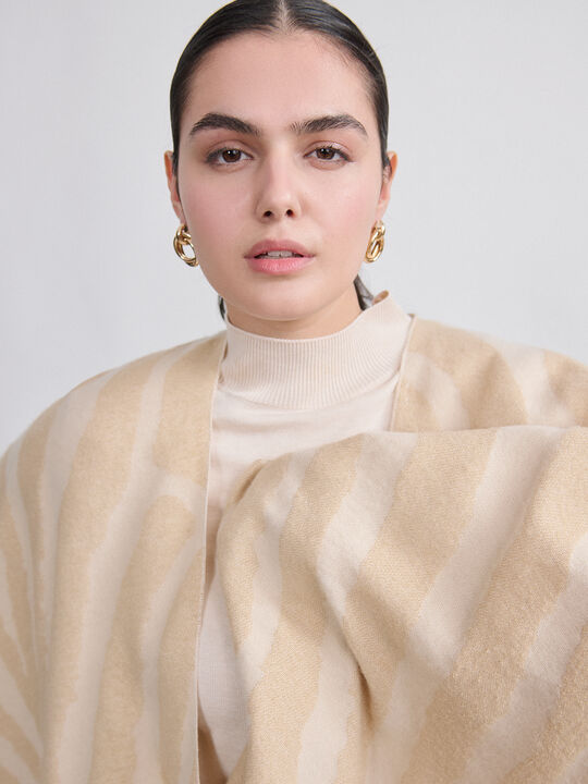 PONCHO ANIMAL PRINT Crudo image number null