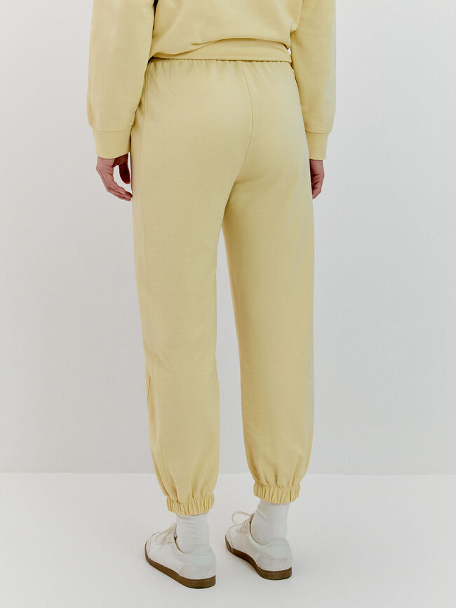 PANTALON LARGO Amarillo Pastel