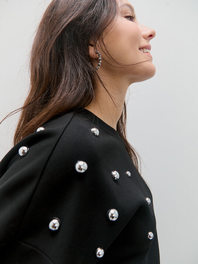 SUDADERA TACHAS Negro