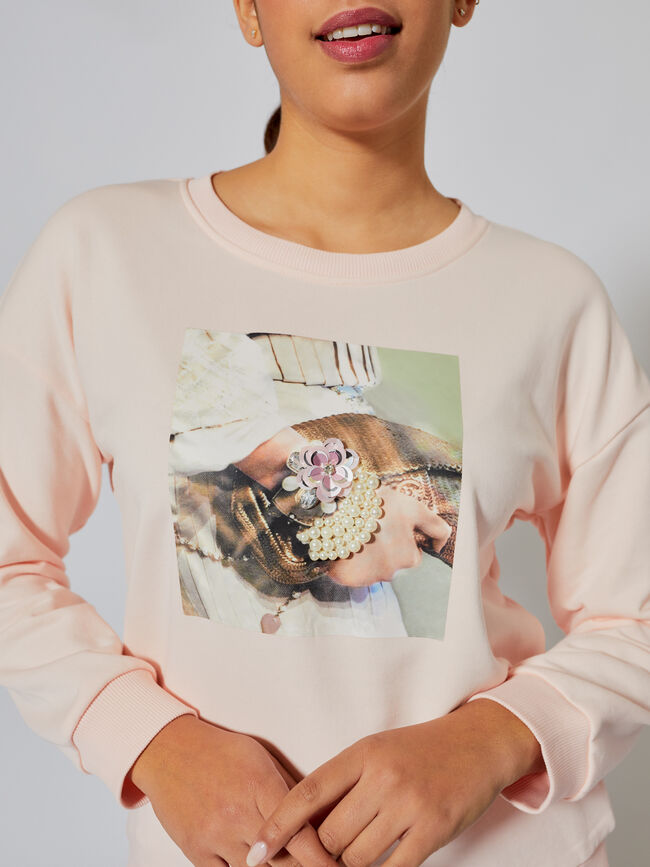 Sudadera detalle perlas Rosa Claro
