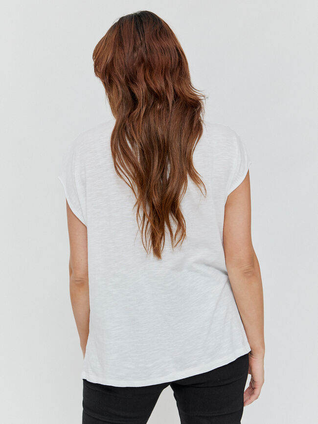 CAMISETA POSICIONAL FLORES Blanco Optico