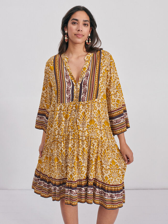 Vestido cenefa vuelo Mostaza