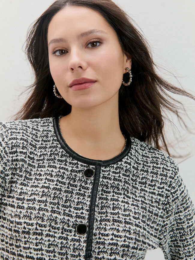 CHAQUETA DETALLE PU Negro