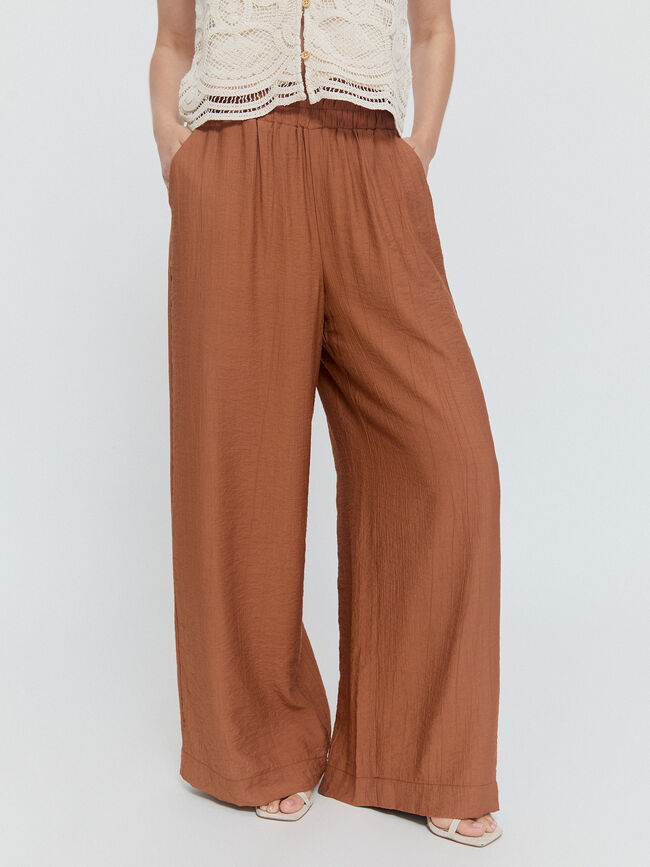 pantalon pata ancha Marron viejo