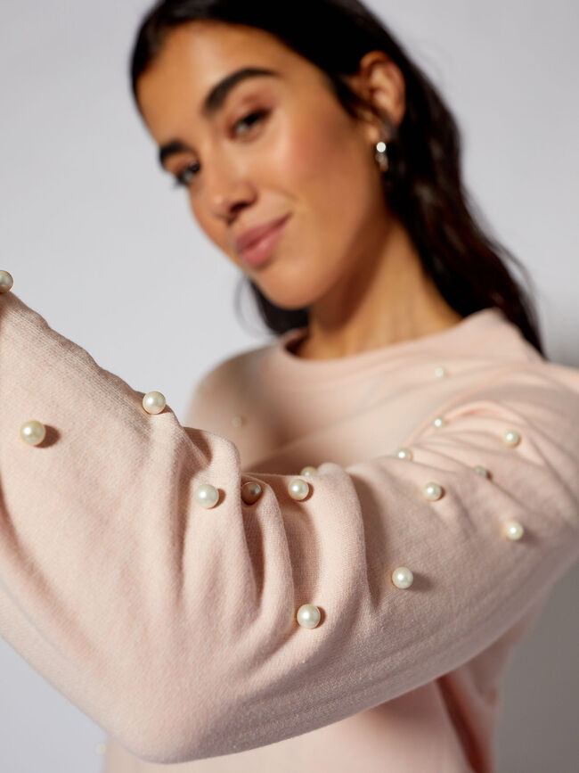 CAMISETA CON PERLAS Y FALDÓN Rosa Claro